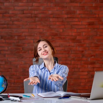front-view-travel-agent-her-working-place-map-indoors-manager-operator-agency-world-service-occupation-worker